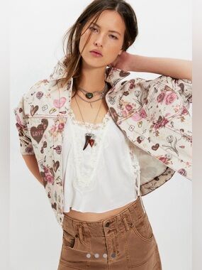 NWT FREE PEOPLE WE THE FREE OPAL
SWING PRINTED DENIM JACKET